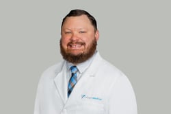 Professional headshot of Joshua Scearce, MD