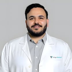 Professional headshot of Malik Abdolkarim, DO