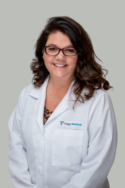 Professional headshot of Karen McDonald, FNP
