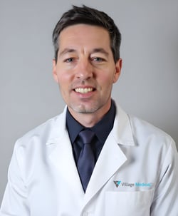 Professional headshot of Micah Bosley, MD