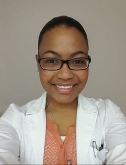 Professional headshot of Kamille Romain, MD