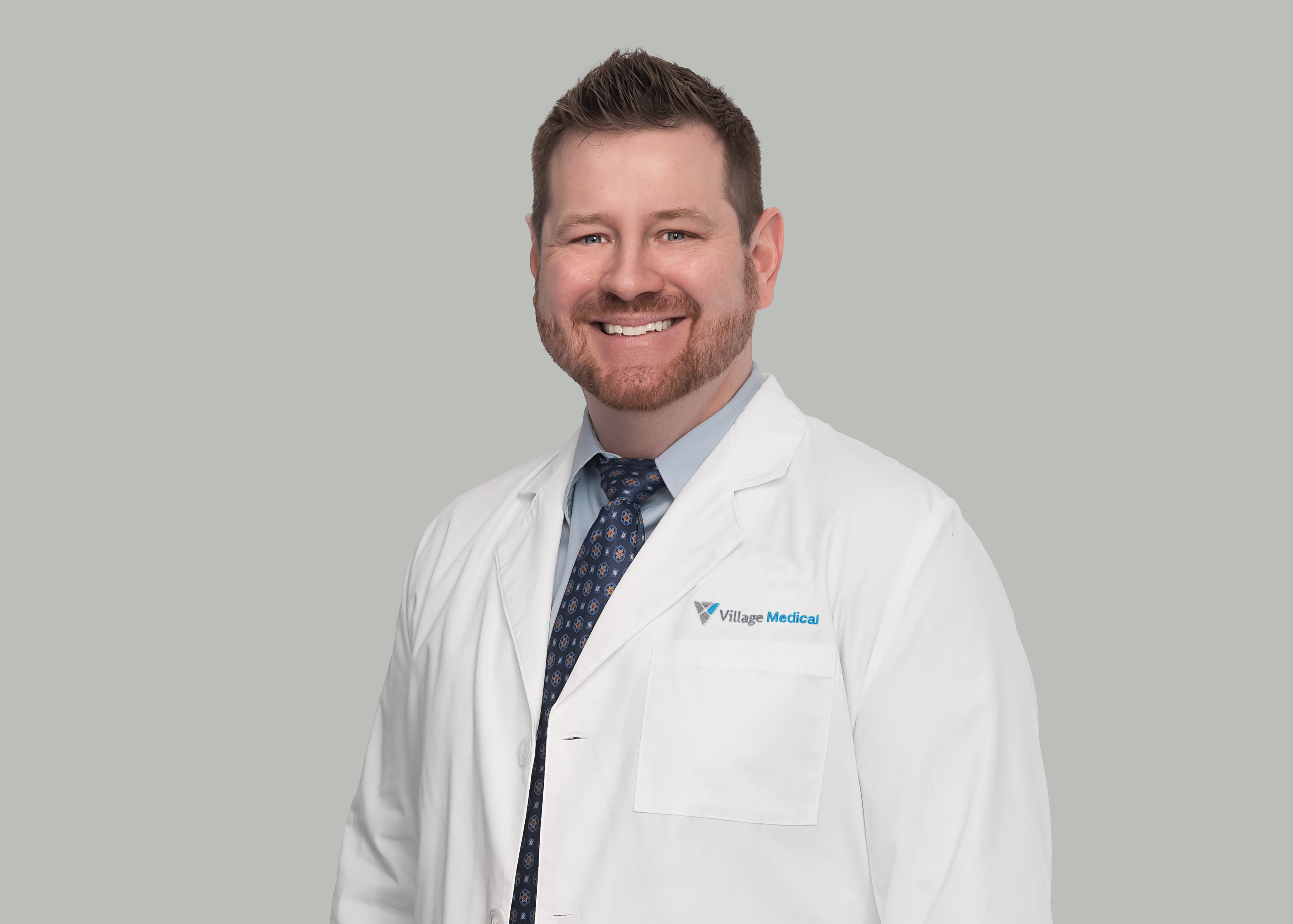 Professional headshot of Aaron Collins, NP