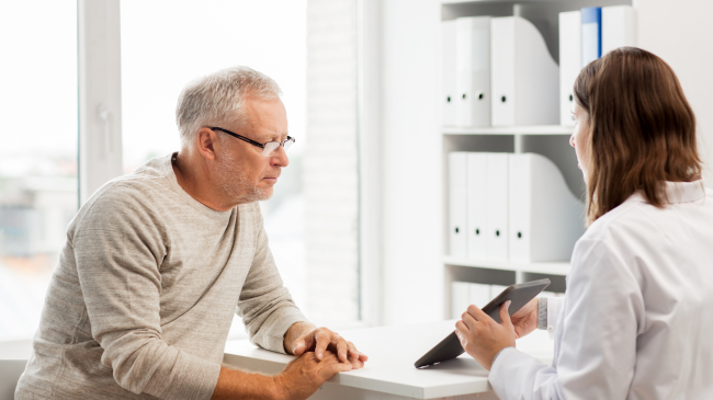 A patient discussing Medicare Annual Enrollment with a Village Medical primary care provider