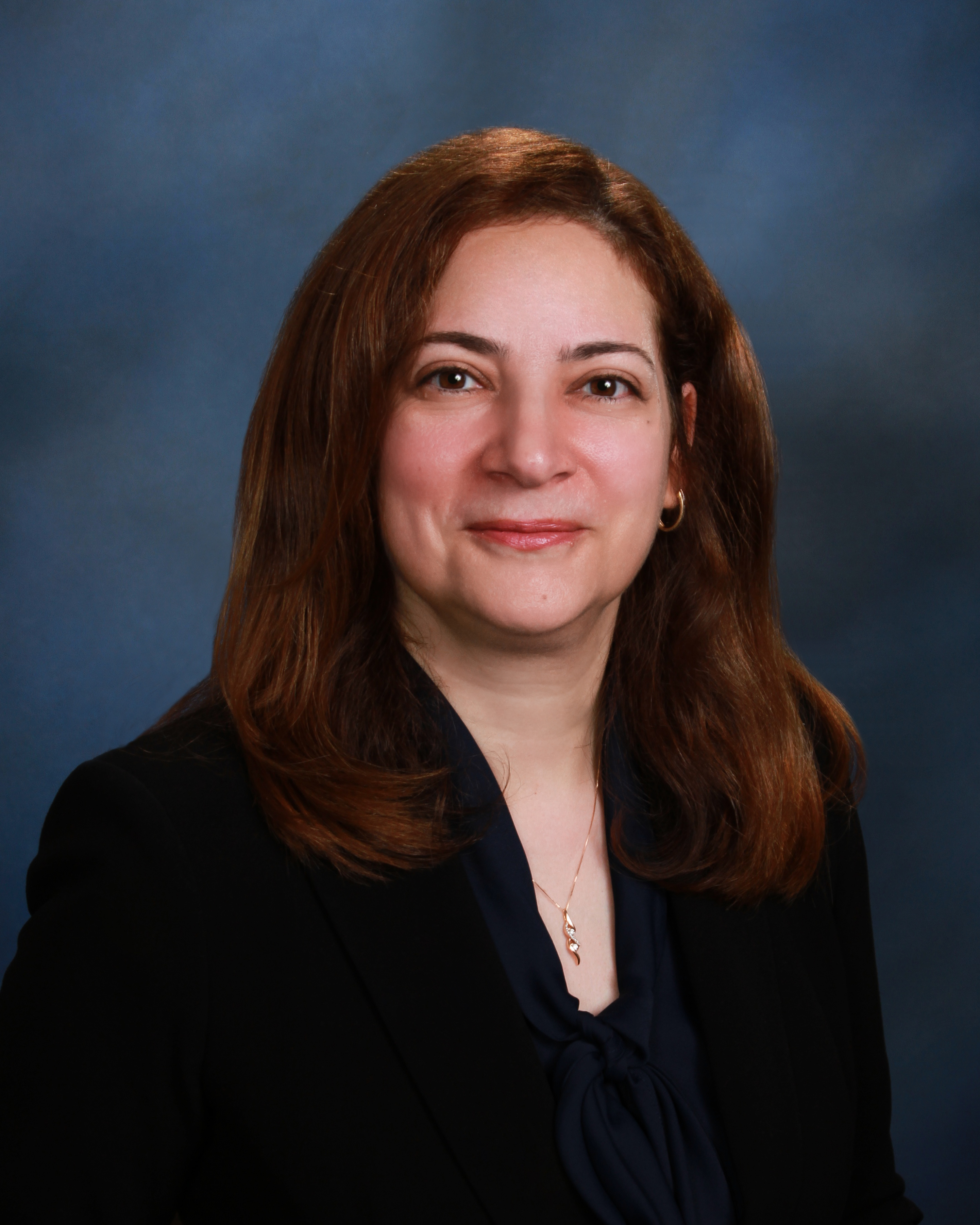 Professional headshot of Ghada Saqer, MD