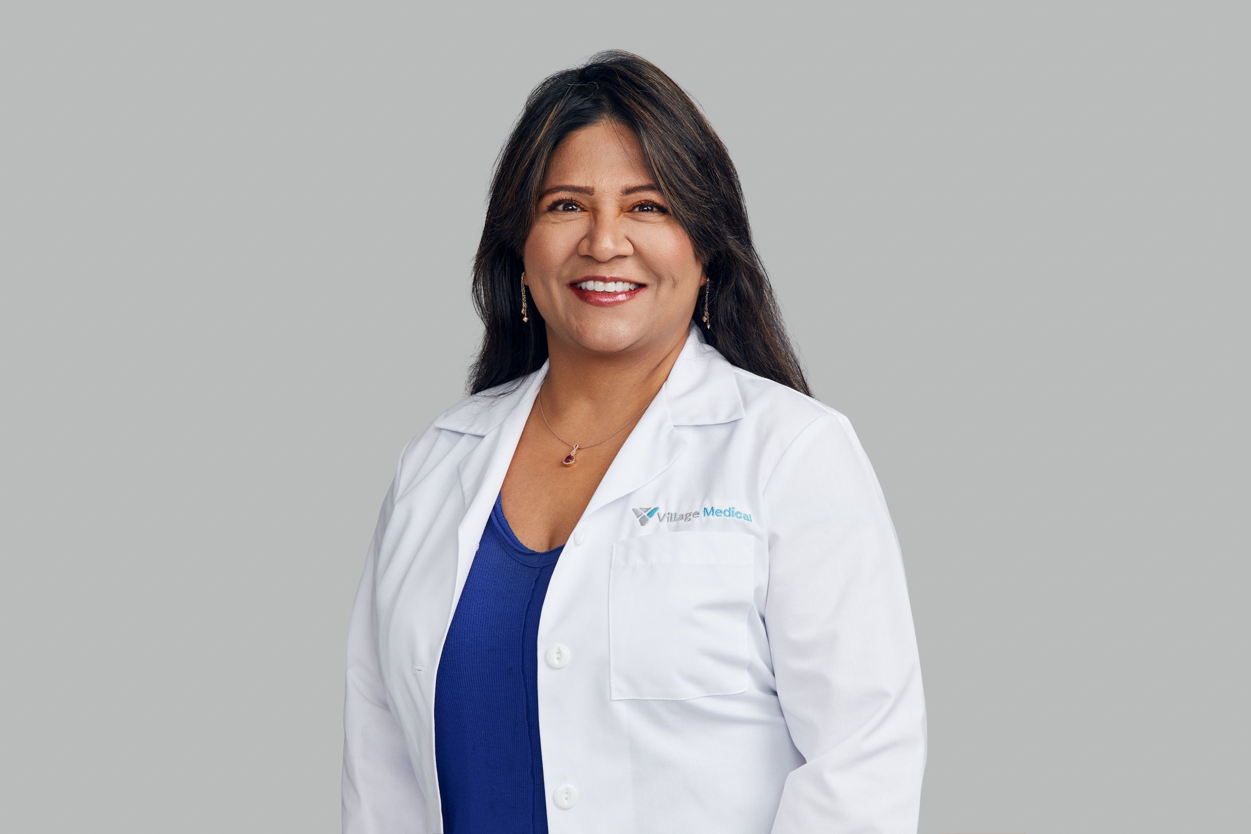 Professional headshot of Rama Devineni, MD