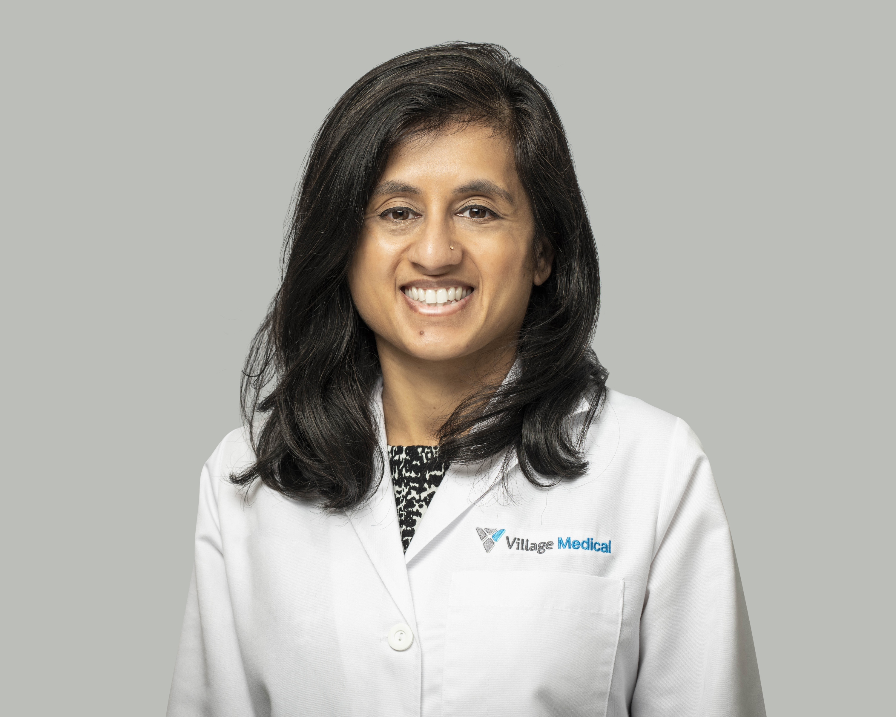 Professional headshot of Rima Bakhda, MD