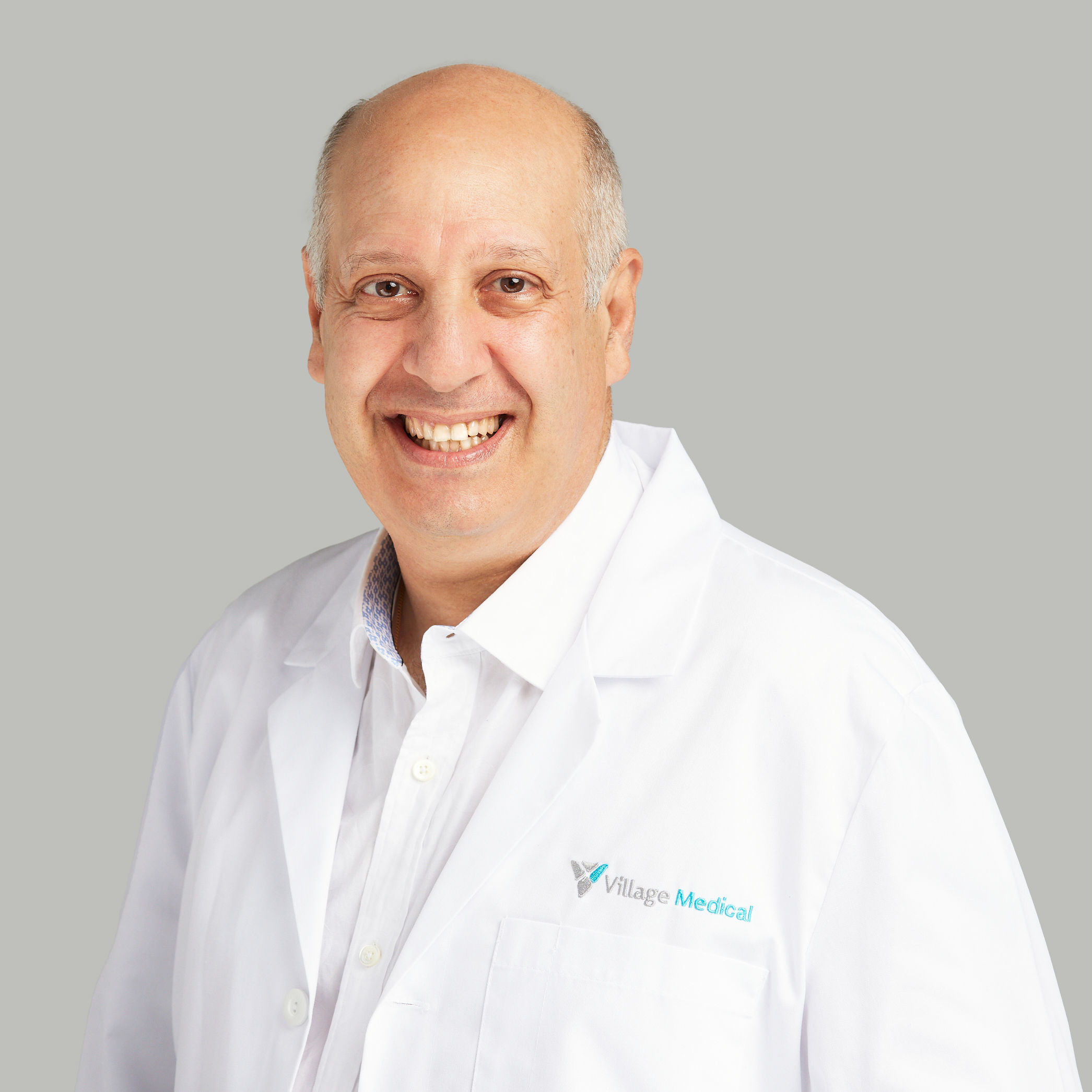 Professional headshot of Ronnie Sheena, MD