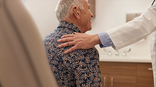 A Village Medical primary care provider helping a man with sleep apnea