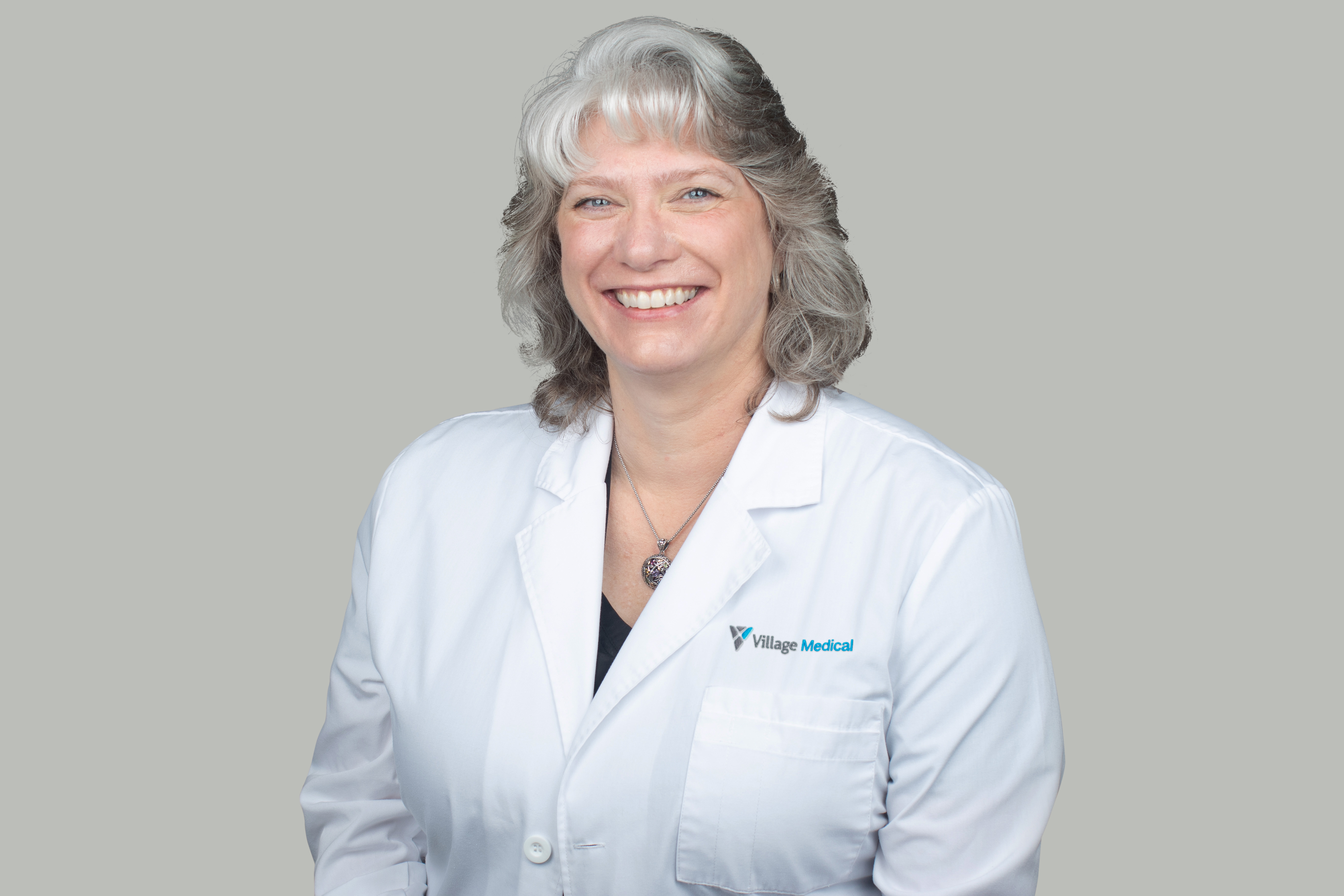 Professional headshot of Christine Watson, NP