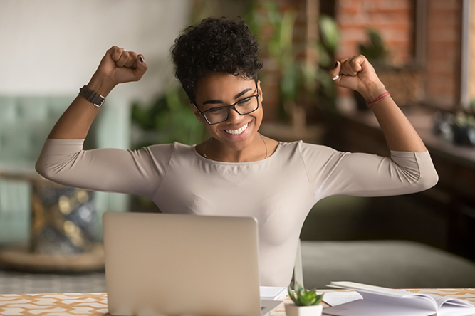 A happy woman celebrating